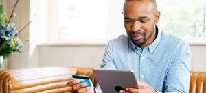 Man looking at tablet